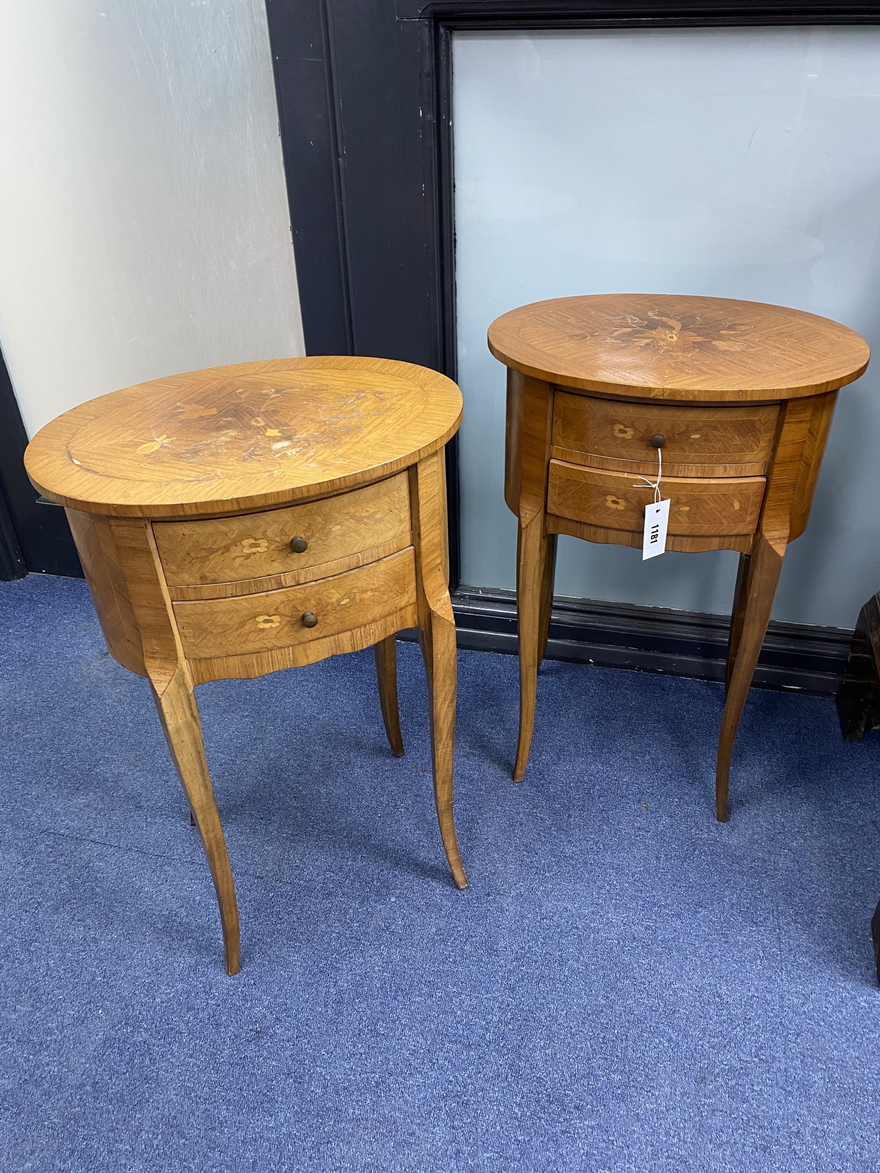 A pair of oval marquetry commodes, width 43cm, depth 31cm, height 64cm